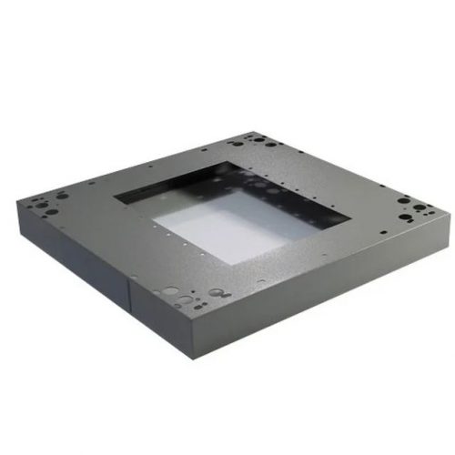 a grey square object with holes