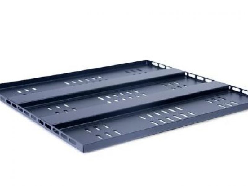 a black metal tray with holes